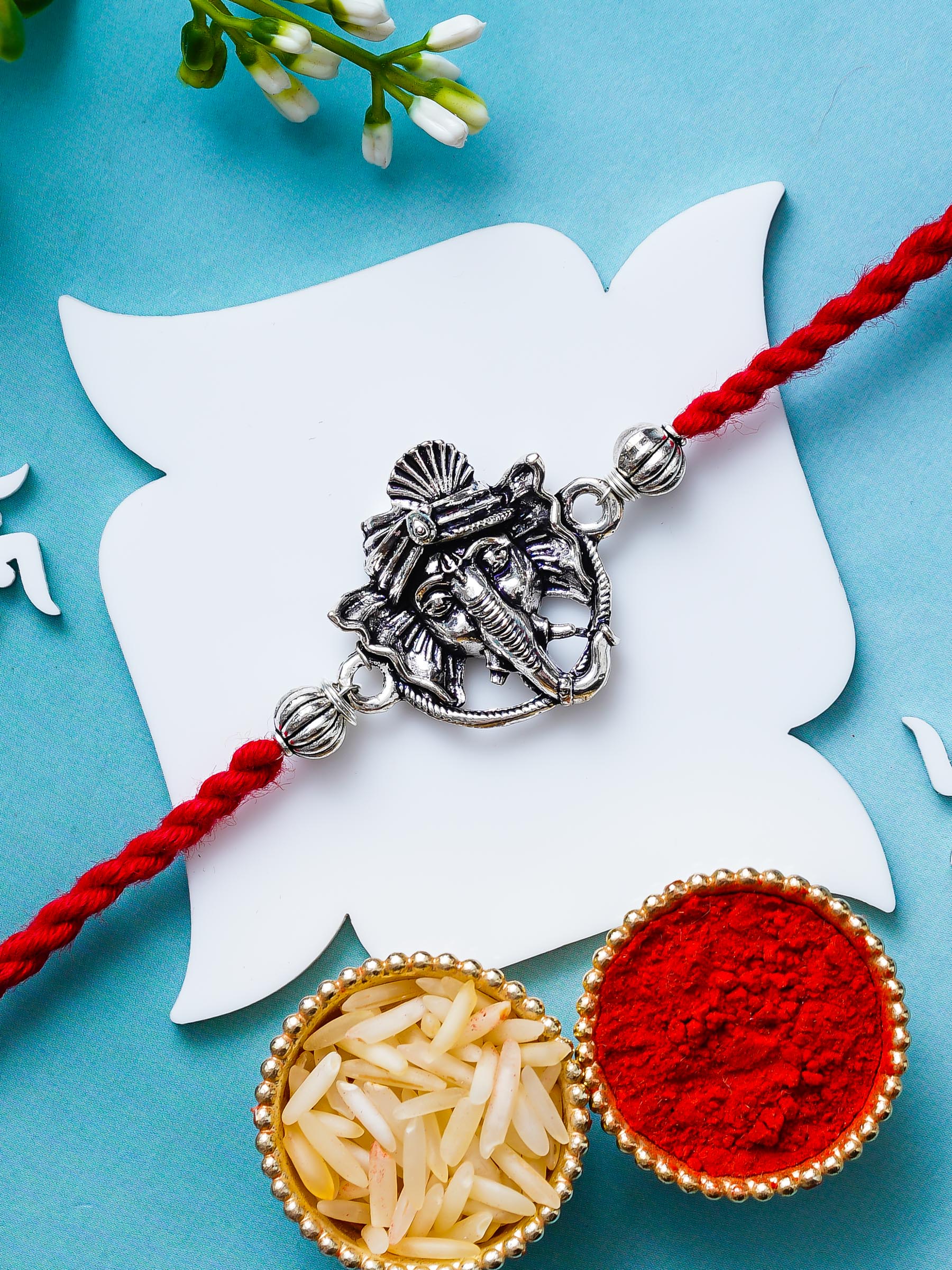 Ganesh Rakhi – Traditional Metal Rakhis – Free Chawal & Kumkum