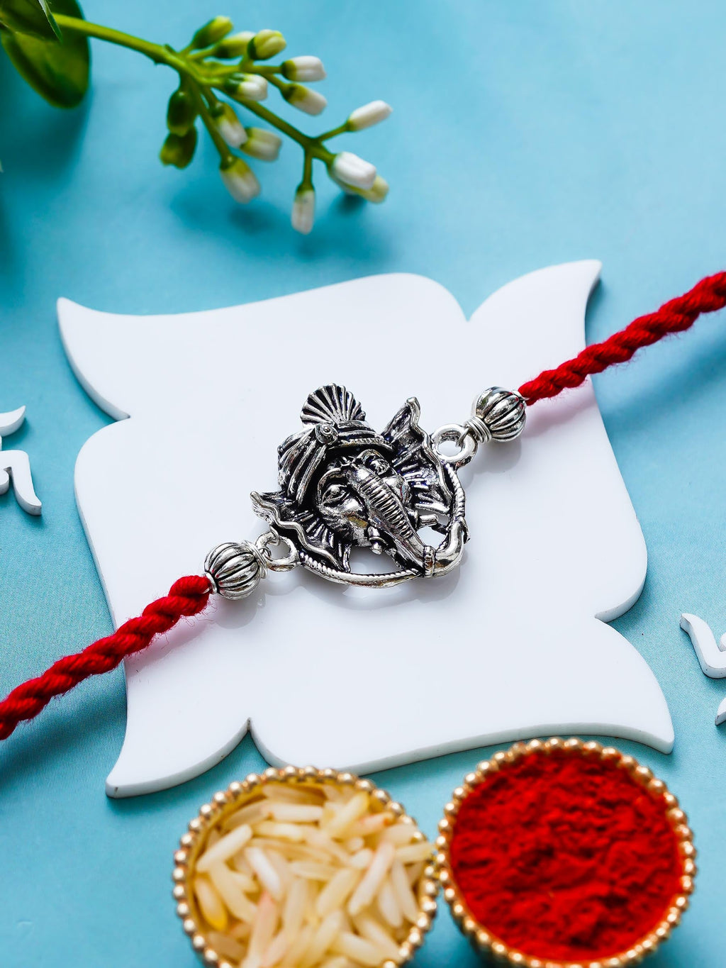 Ganesh Rakhi – Traditional Metal Rakhis – Free Chawal & Kumkum
