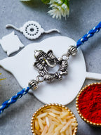 Ganesh Rakhi – Traditional Metal Rakhis – Free Chawal & Kumkum