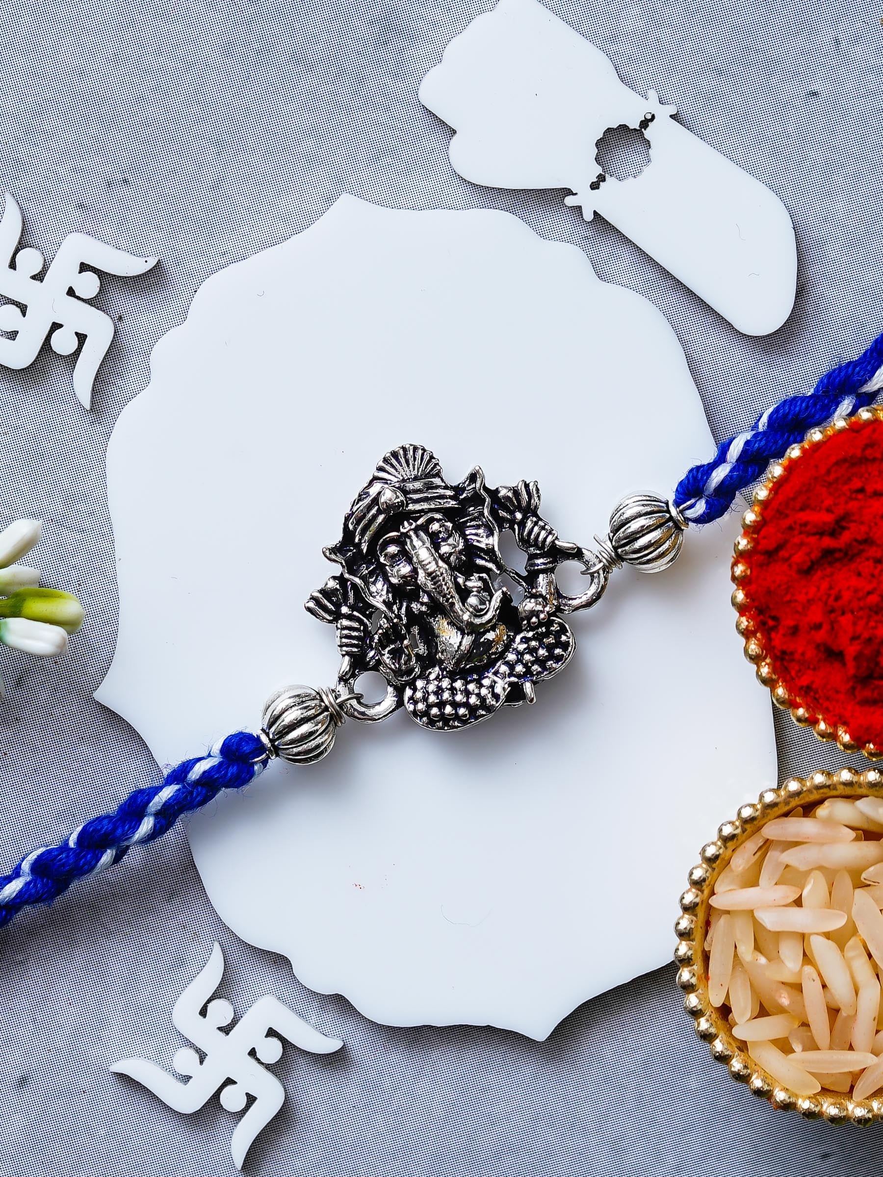 Ganesh Rakhi – Traditional Metal Rakhis – Free Chawal & Kumkum