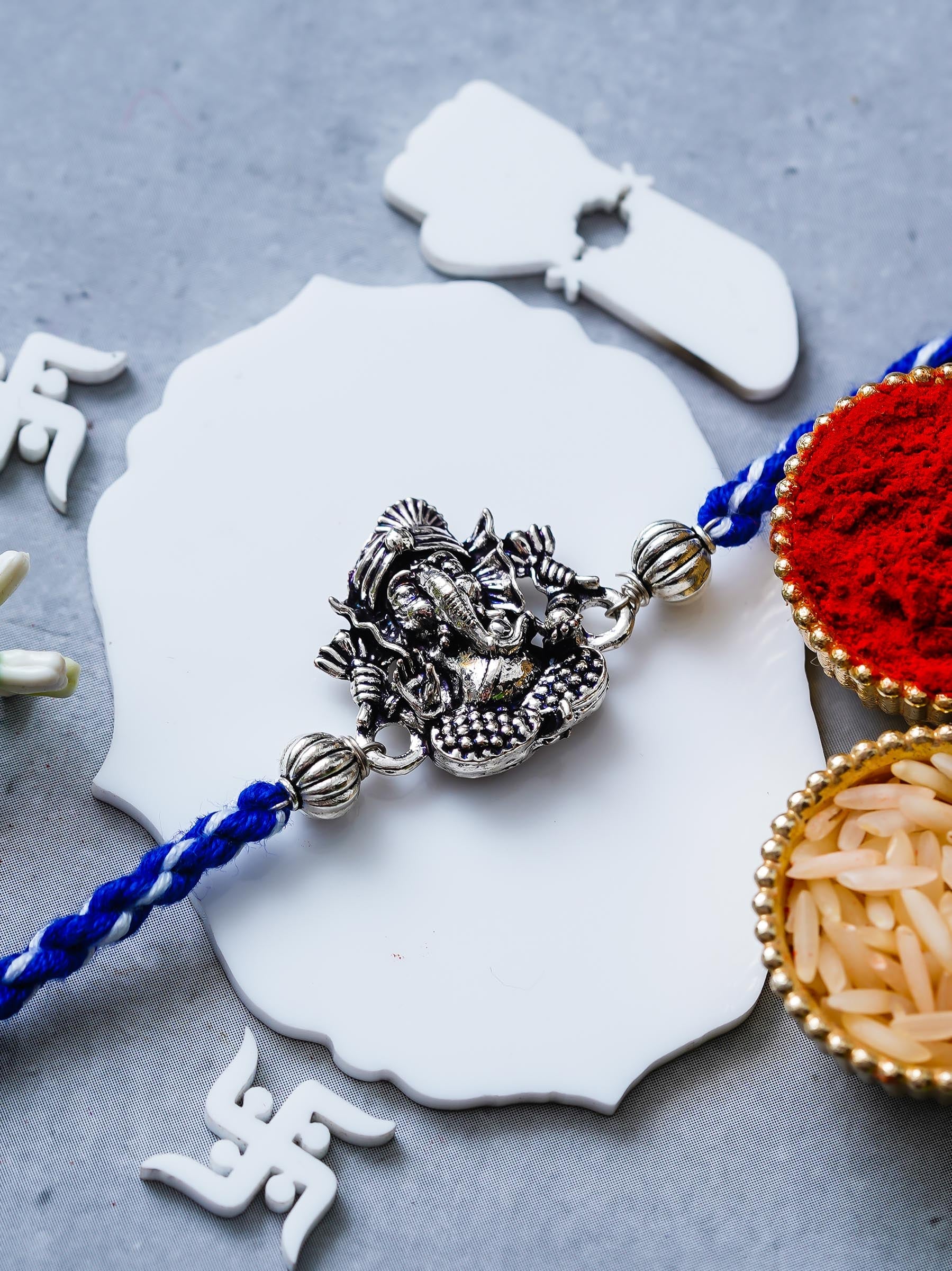 Ganesh Rakhi – Traditional Metal Rakhis – Free Chawal & Kumkum
