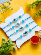 Evil Eye Rakhi Set of 4 – Protection Charm Rakhis – Free Chawal & Kumkum