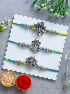 Lord Ganesha Rakhi Set of 3 – Antique Metal Finish – Free Chawal & Kumkum