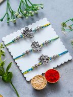 Lord Ganesha Rakhi Set of 3 – Antique Metal Finish – Free Chawal & Kumkum