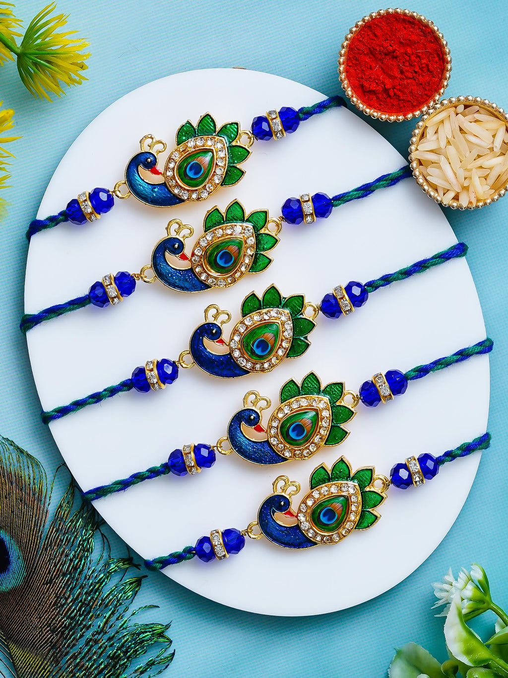 Peacock Design Rakhi Set of 5 – Decorative Stone Rakhis – Free Chawal & Kumkum
