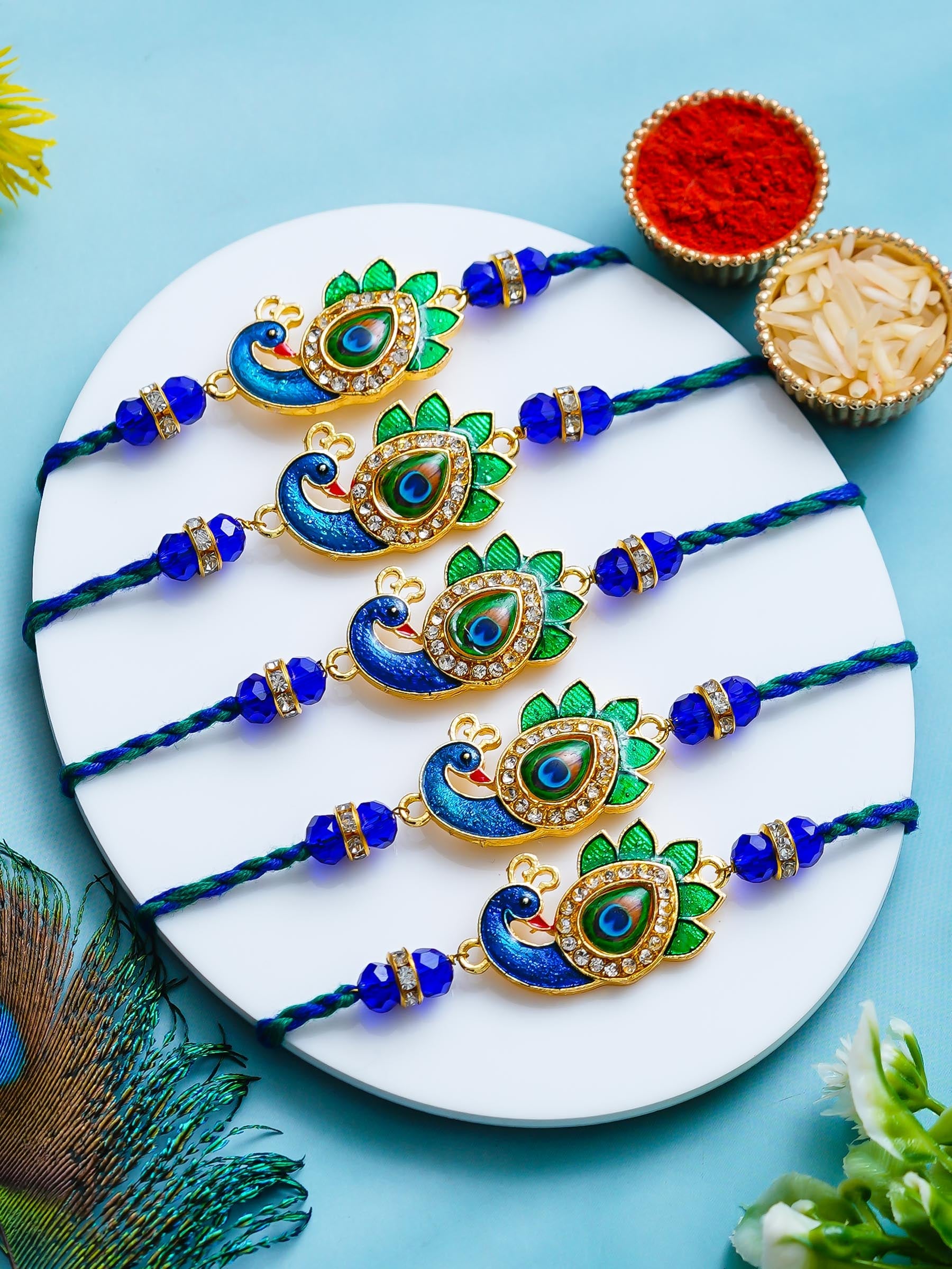 Peacock Design Rakhi Set of 5 – Decorative Stone Rakhis – Free Chawal & Kumkum