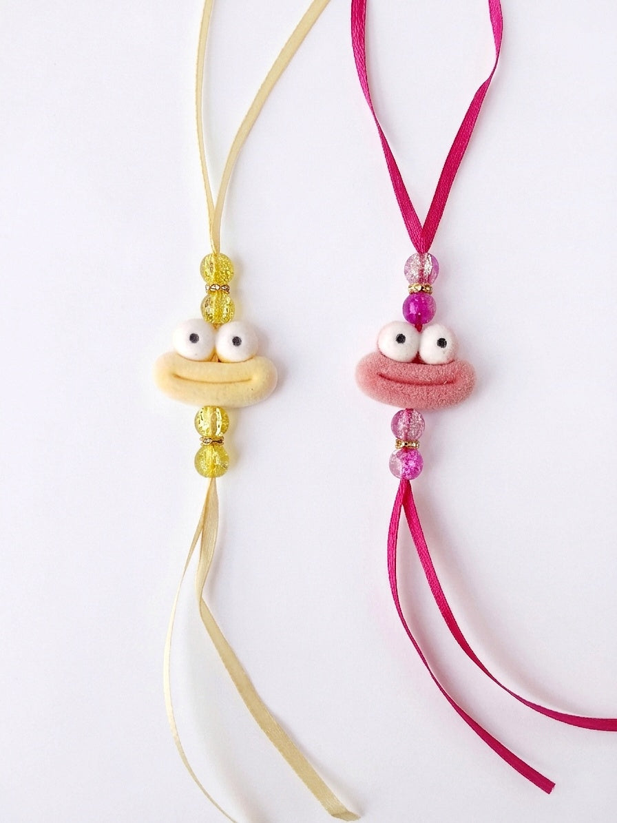 Smiley Face Rakhi Set