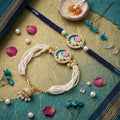 Blue Floral Pearl Rakhi Set