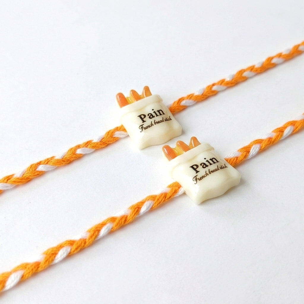 Mini Bread Charm Rakhi Set