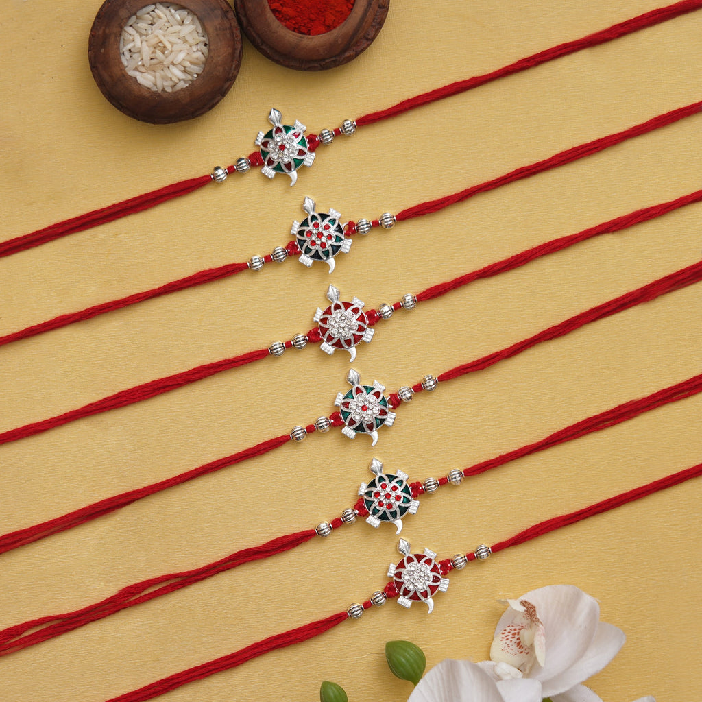 Traditional Chakra Rakhi Set with Free Kumkum & Chawal
