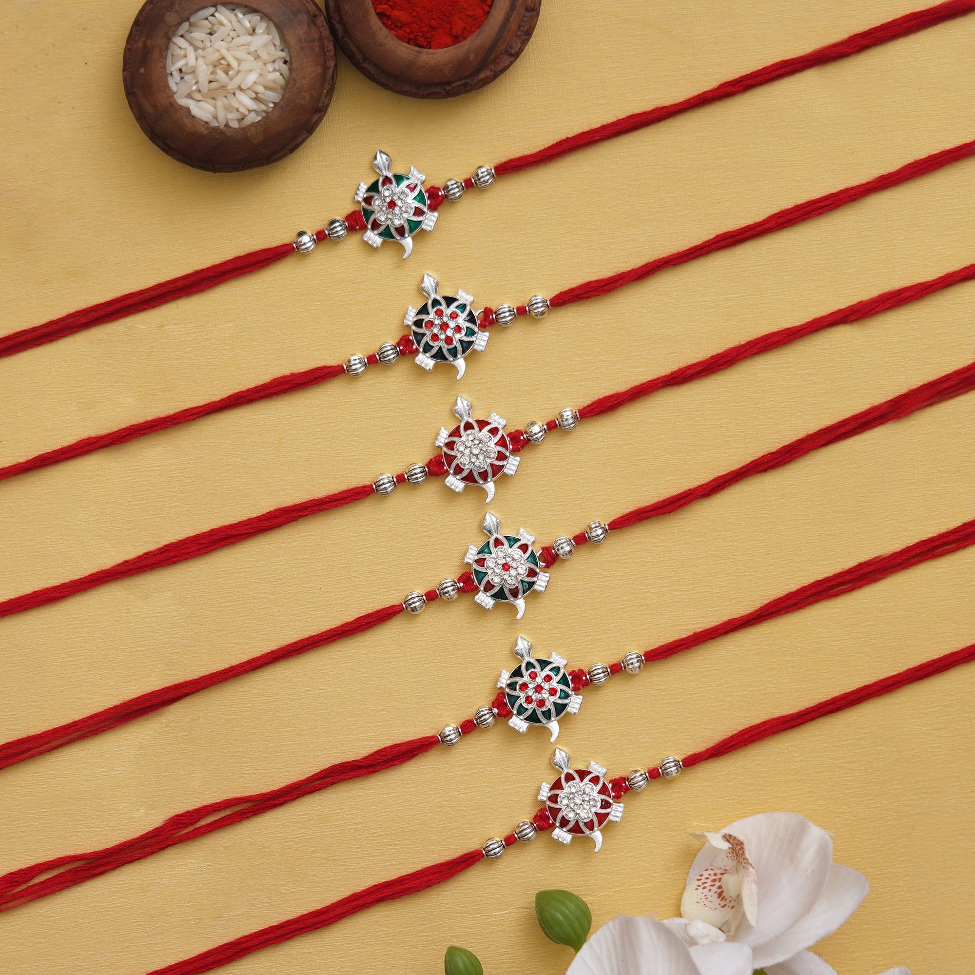 Traditional Chakra Rakhi Set with Free Kumkum & Chawal